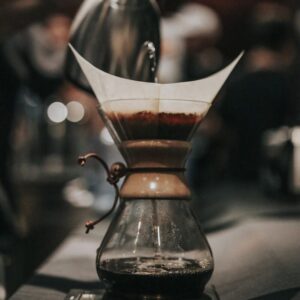 shallow focus photography of black and brown coffeemaker